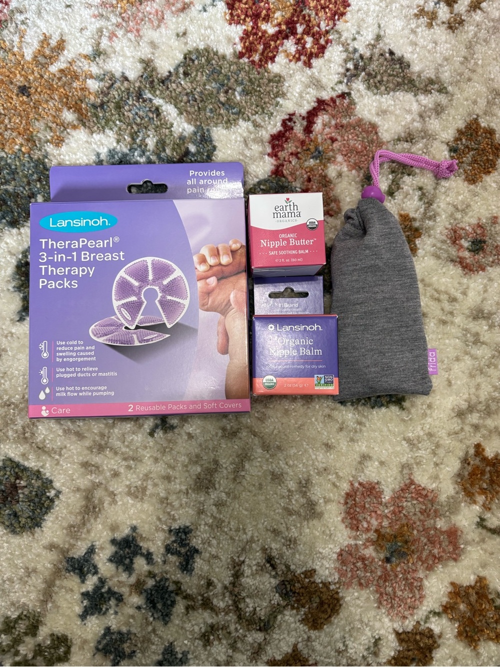 Lansinoh Breast Therapy Packs, Nipple Butter/Balm, and massager